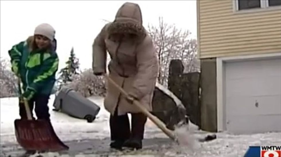 Ice storm leaves more than 100,000 without power from Maine to the Midwest