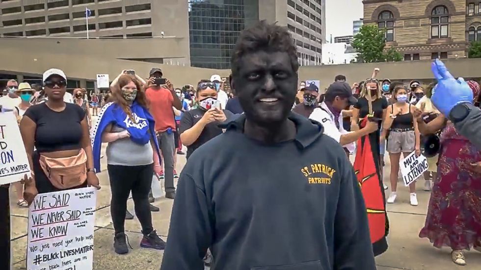 Police charge man with 'disturbance' for wearing blackface to George Floyd demonstration