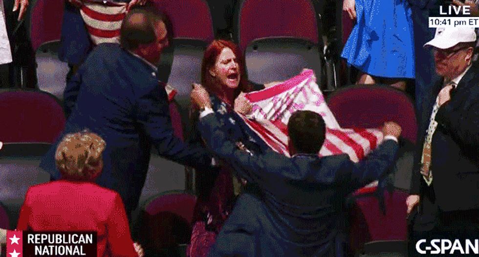 WATCH: Code Pink co-founder mobbed by angry Trump supporters for holding up 'No hate' sign