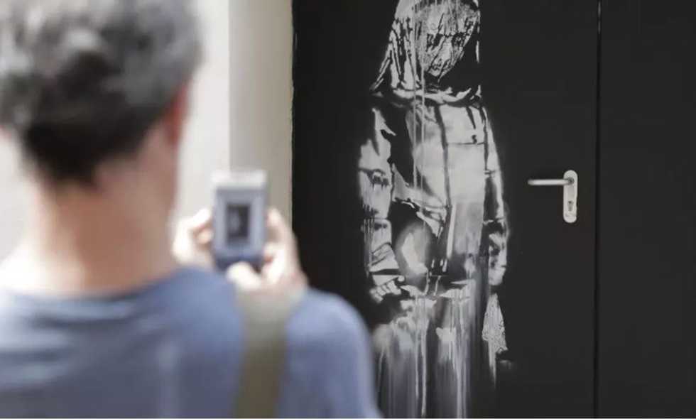 Banksy artwork stolen from Paris’s Bataclan concert hall found in Italy