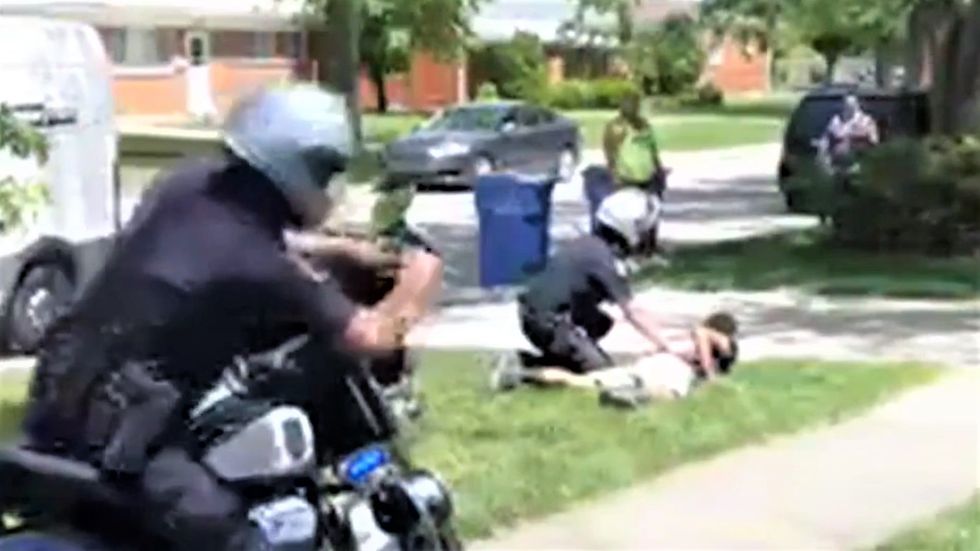WATCH: Neighbors stunned as cop takes down Black Amazon driver for parking the wrong way