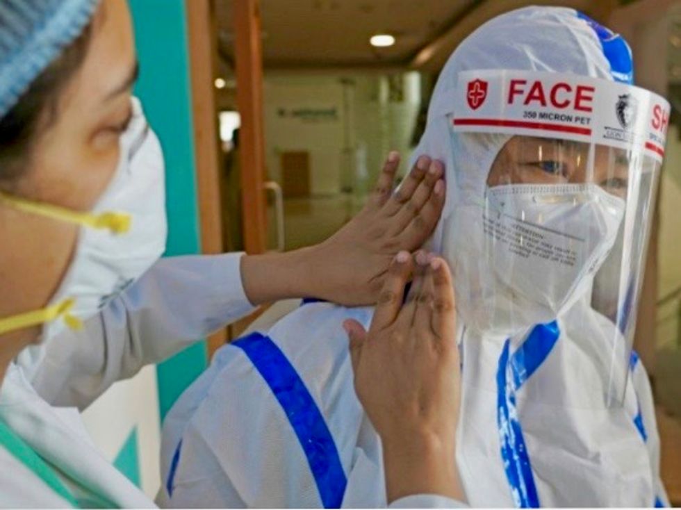 Exhausted Indian doctors fear virus crisis has only begun