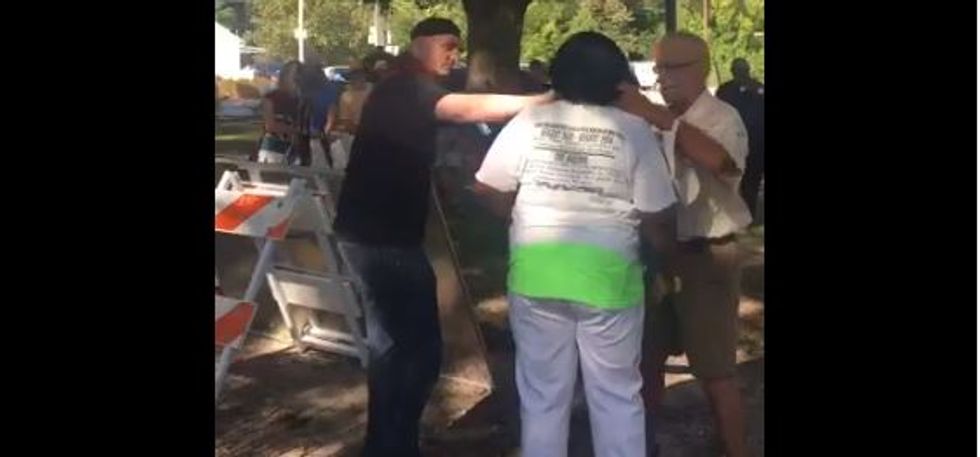 Anti-Confederate monument protesters hold 'mock slave auction' at Virginia Beach rally