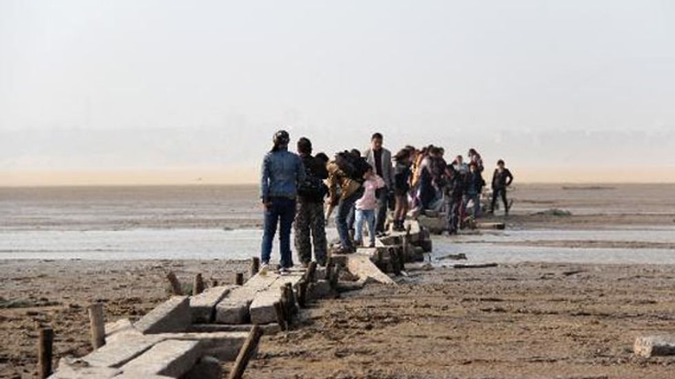 Ancient stone bridge revealed after Chinese lake dries up