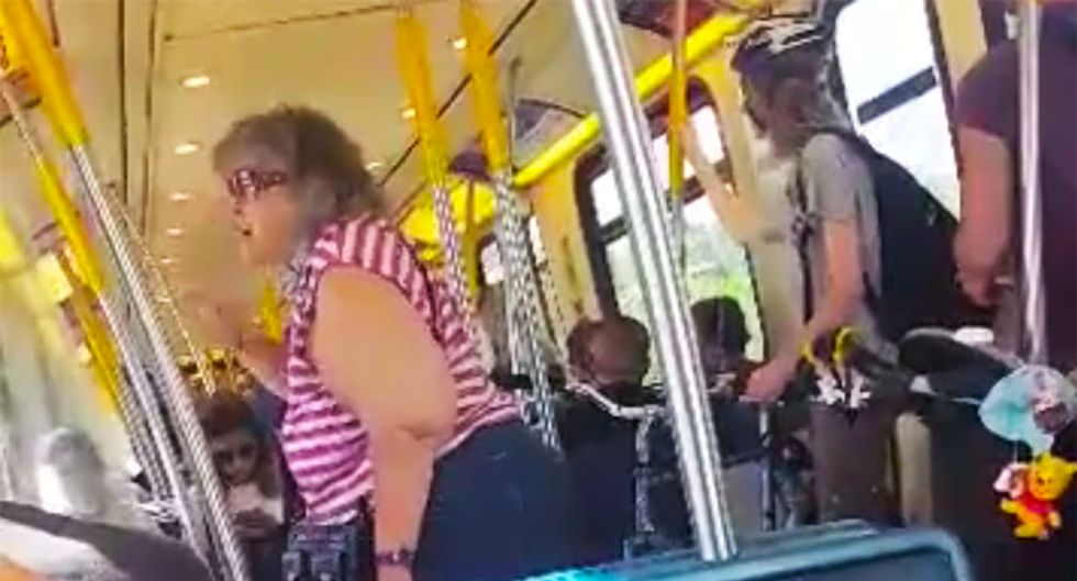 WATCH: Teen train passenger shuts down white woman's screaming racist tirade at Filipino couple