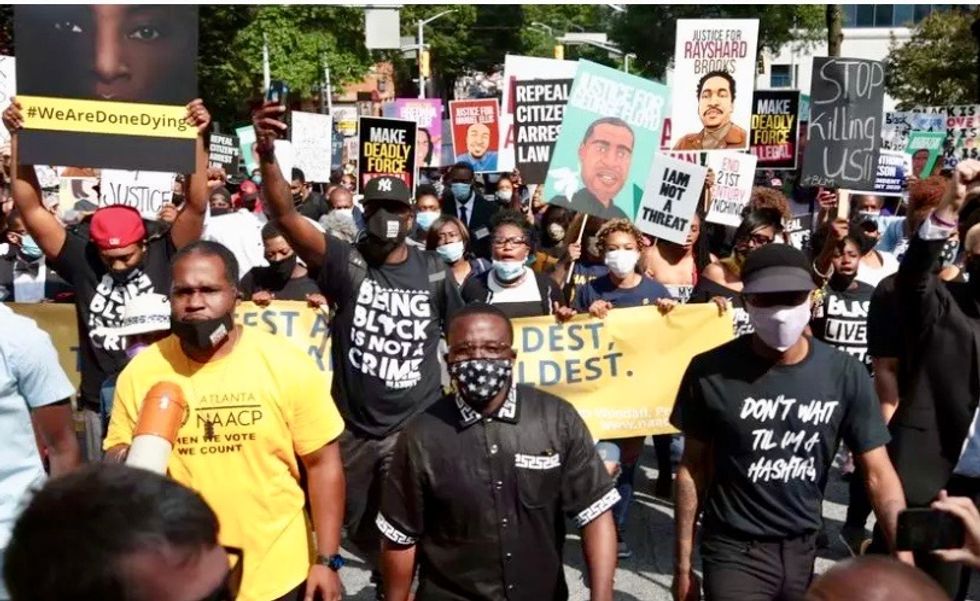 'We are done dying': protesters march on Georgia capitol