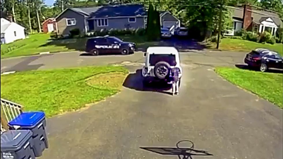 Caught on video: Black child playing basketball alone hides in fear when he sees police drive by