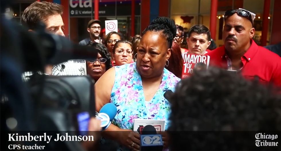 WATCH: Chicago teachers crash GOP governor's press conference after he calls them 'illiterate'