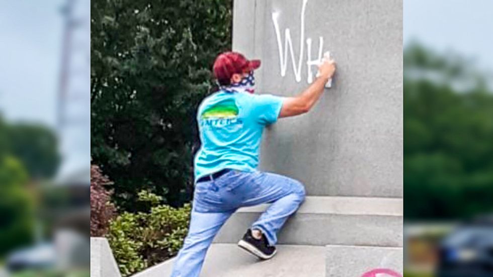 Man spray paints ‘white lives matter’ on statue of black hero Arthur Ashe