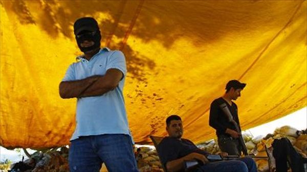 Mexican security forces seize cartel stronghold in Michoacan
