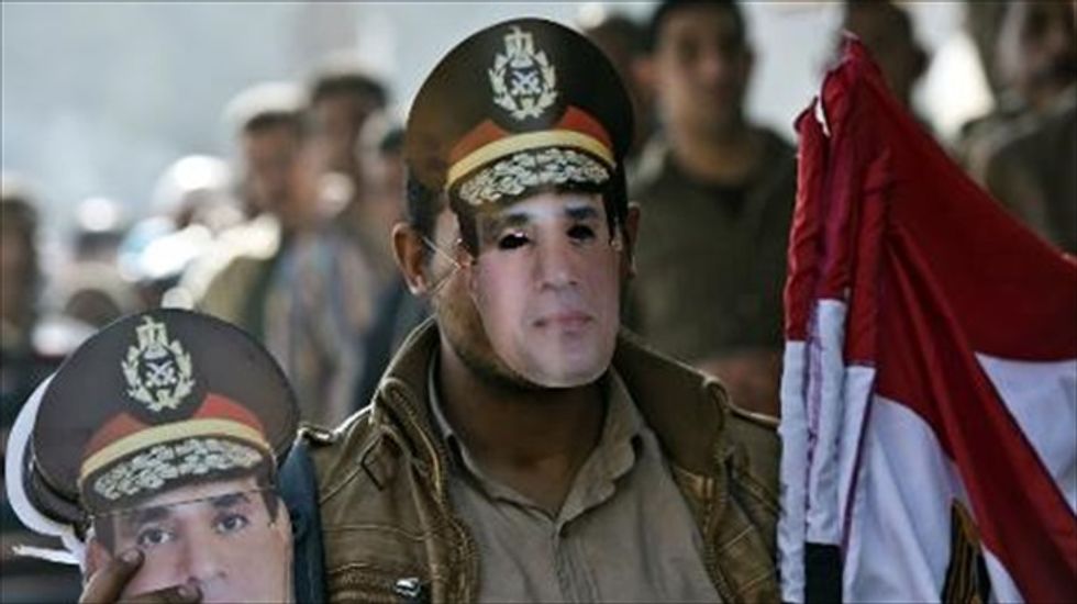 Egyptian military keeps an eye on referendum for a new constitution