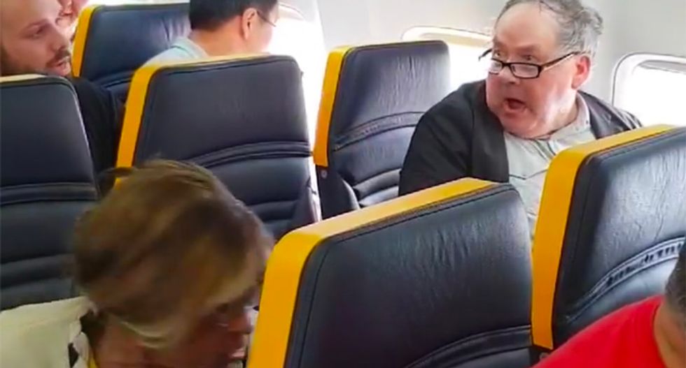 WATCH: Racist white man abuses elderly black woman on flight forcing passengers and attendants to step in