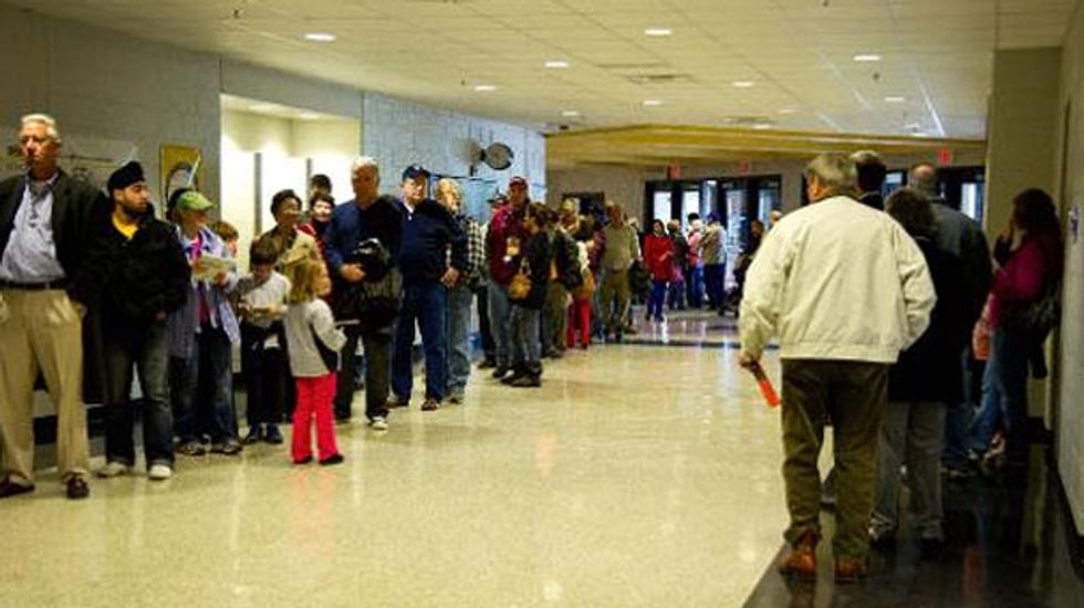 Michigan Repubs pass last-minute bill creating longer voting lines -- to stifle turnout