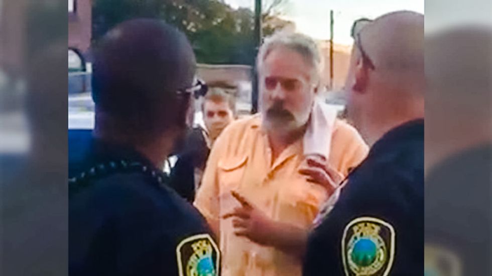 WATCH: Ex-Chicago cop chews out Asheville police for not arresting Trump fan who punched woman