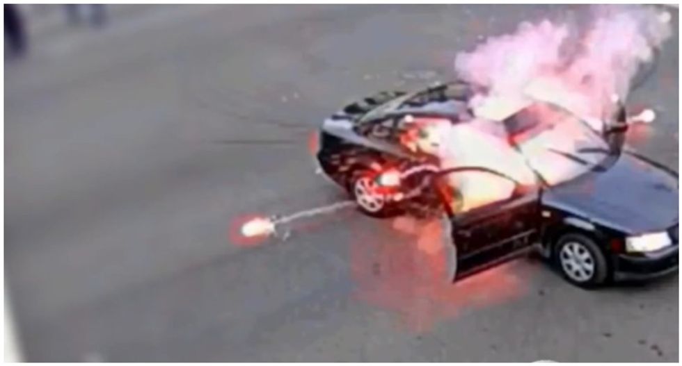 WATCH: Driver ignites firework at Black Lives Matter protest -- but protester tosses it back into his car
