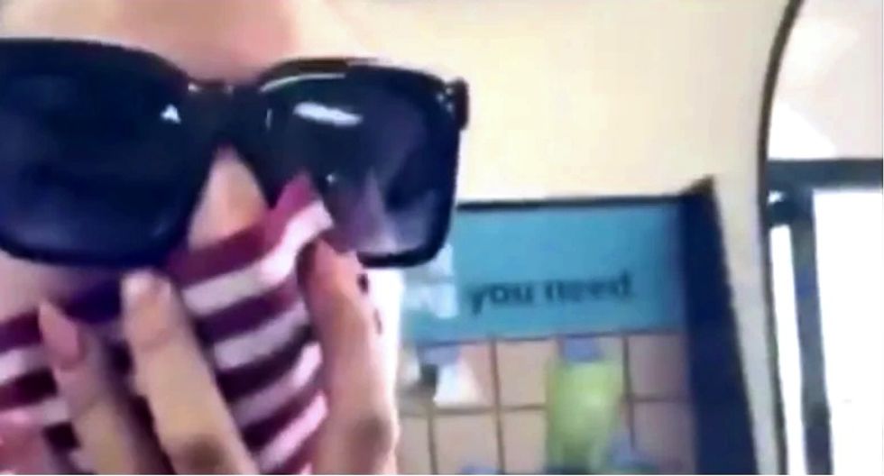 WATCH: Mask-hating woman coughs on ‘sheep’ at UPS Store after they ask her to leave for holding US flag over her face