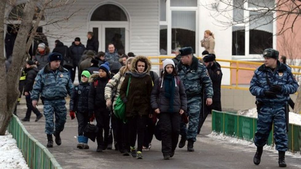 Authorities detain teen gunman who killed two during standoff at Moscow school