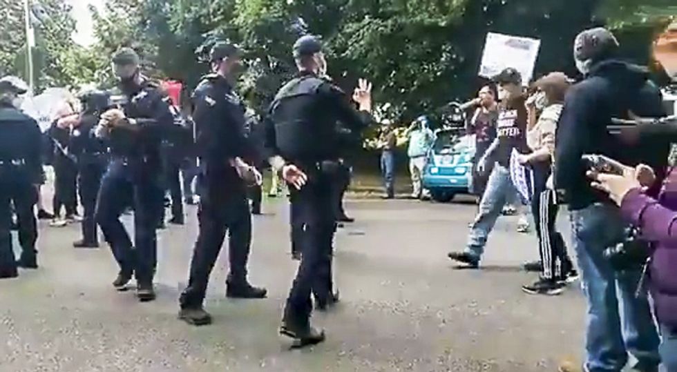 Oregon cop accused of flashing 'white power' sign at anti-Black Lives Matters protesters