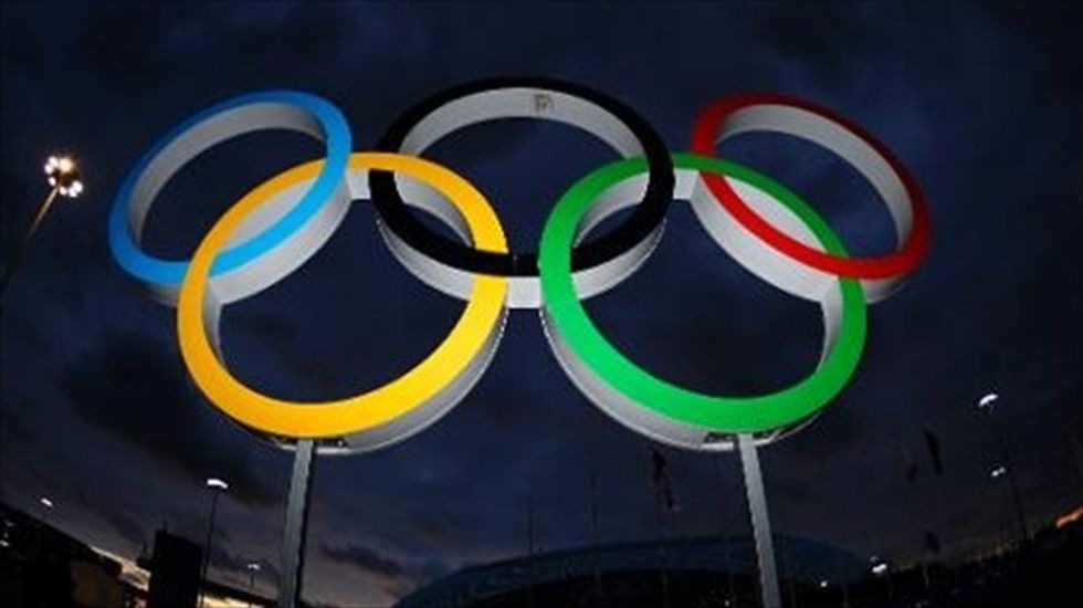 Olympic ban looms for Russian athletes after panel ruling