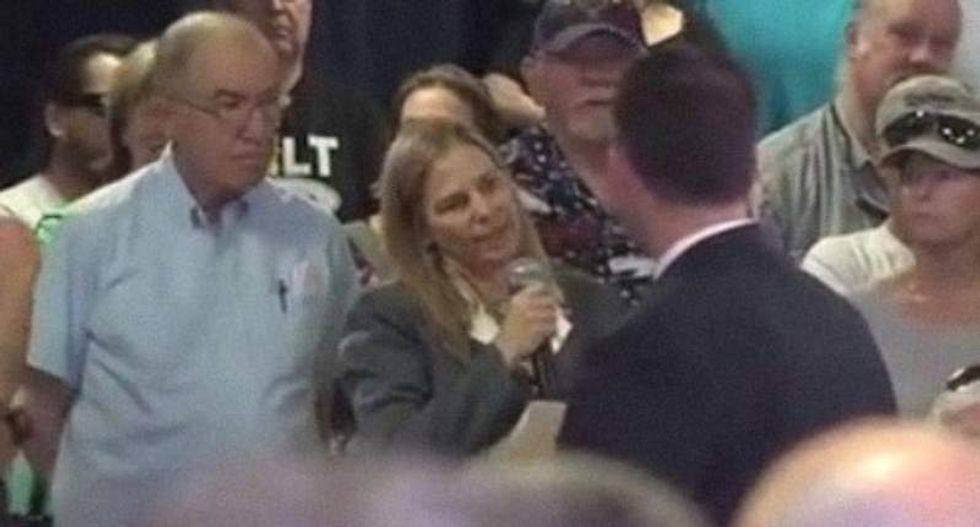 WATCH: Pro-Trump crowd boos Air Force mom questioning Pence about Khan family smears