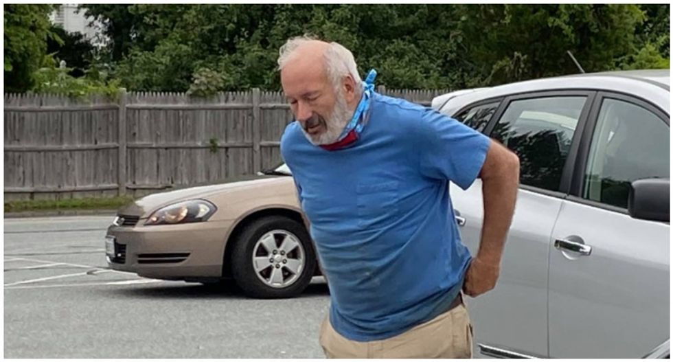 Man repeatedly punches woman in the head and calls her homophobic slur because he didn't like how she parked