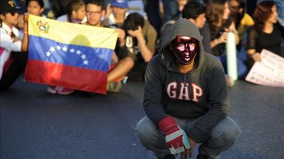 Students launch fresh protests in Venezuela as Maduro warns of coup attempt