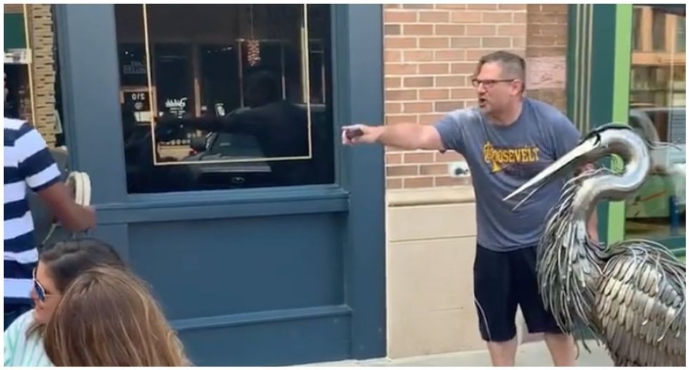 WATCH: White man yelling racial slurs has a meltdown in Sioux Falls after he gets doused with water