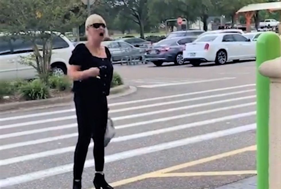 WATCH: Woman storms off Walmart parking lot after employees laugh at her tantrum over face masks