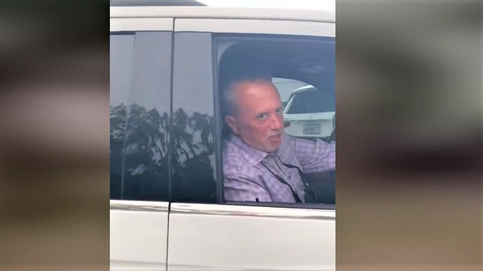 GOP sheriff hurls profanity at reporter after fight erupts at debate -- then throws up a middle finger as he leaves