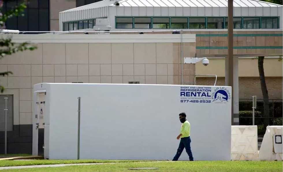 In virus-hit Texas and Arizona, refrigerated trucks to store dead