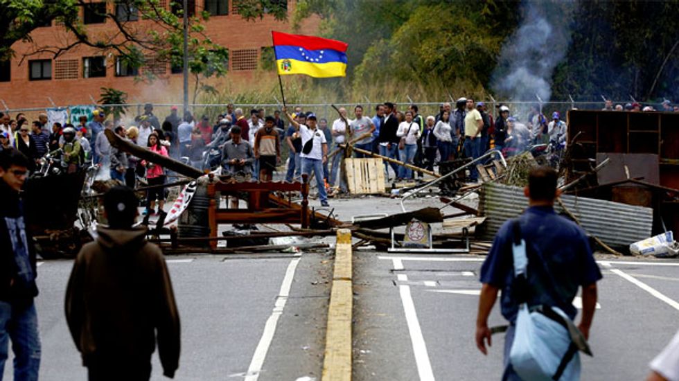 Violence in the streets as Venezuelan security forces clash with students