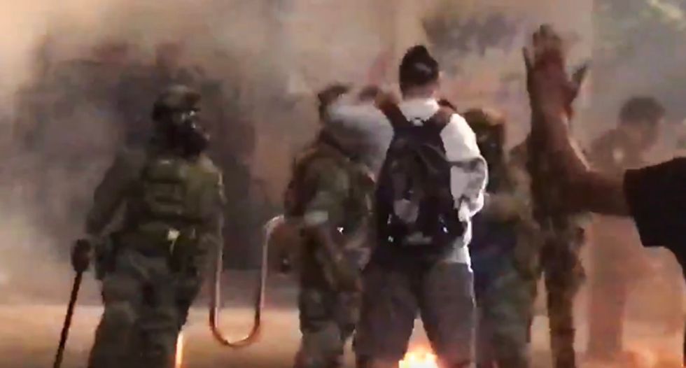 Portland police declare riot after police union building set on fire