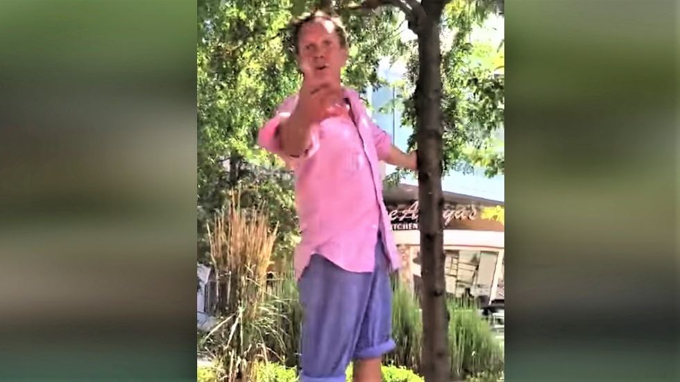 'Go to your own country!' Man goes on bigoted rant against woman for sitting in a park