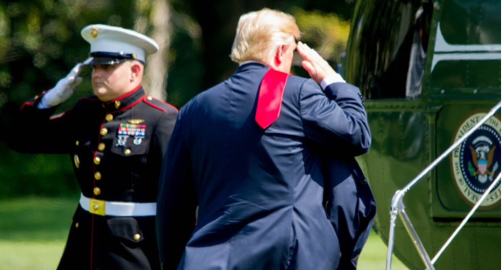 Marine belonging to Trump's helicopter squadron tests positive for COVID: report