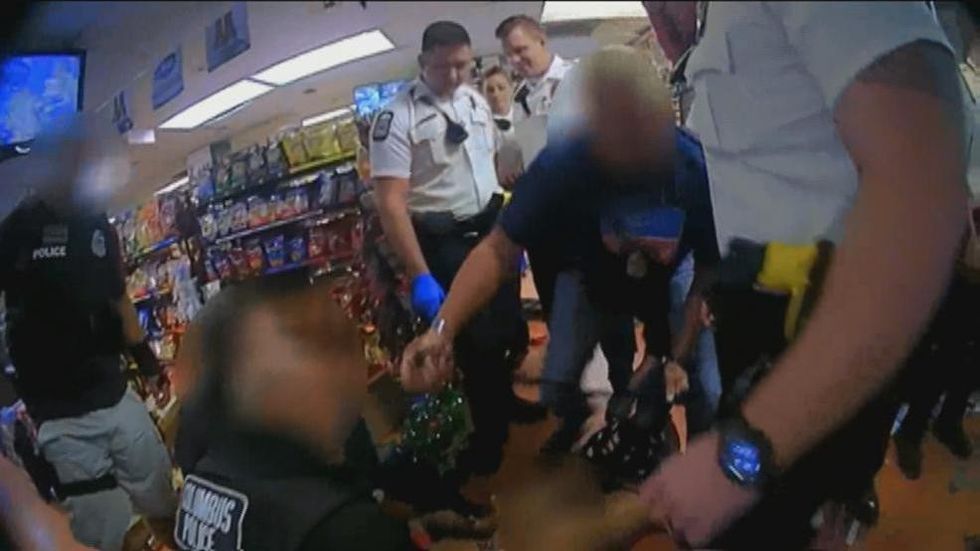 WATCH: Ohio cop threatens to 'choke the life out of' man in custody