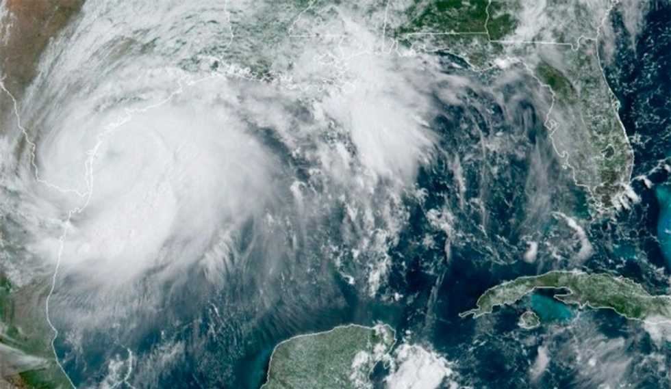 Hurricane Hanna downgraded to tropical storm as it lands in virus-hit Texas