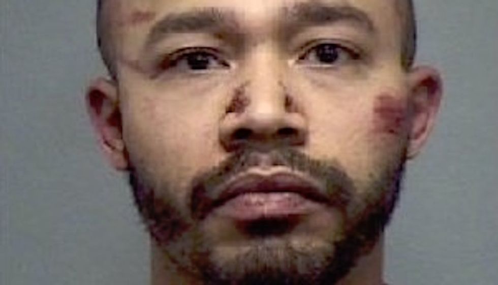 WATCH: Police strike black man in the head with a Taser — while he's handcuffed and pinned down by four cops