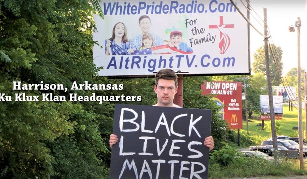Man holding Black Lives Matter sign in 'America's most racist town' gets pelted with nonstop threats and abuse