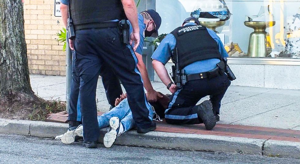 WATCH: New Jersey cops accused of 'beating' Latino child for not wearing a bicycle helmet