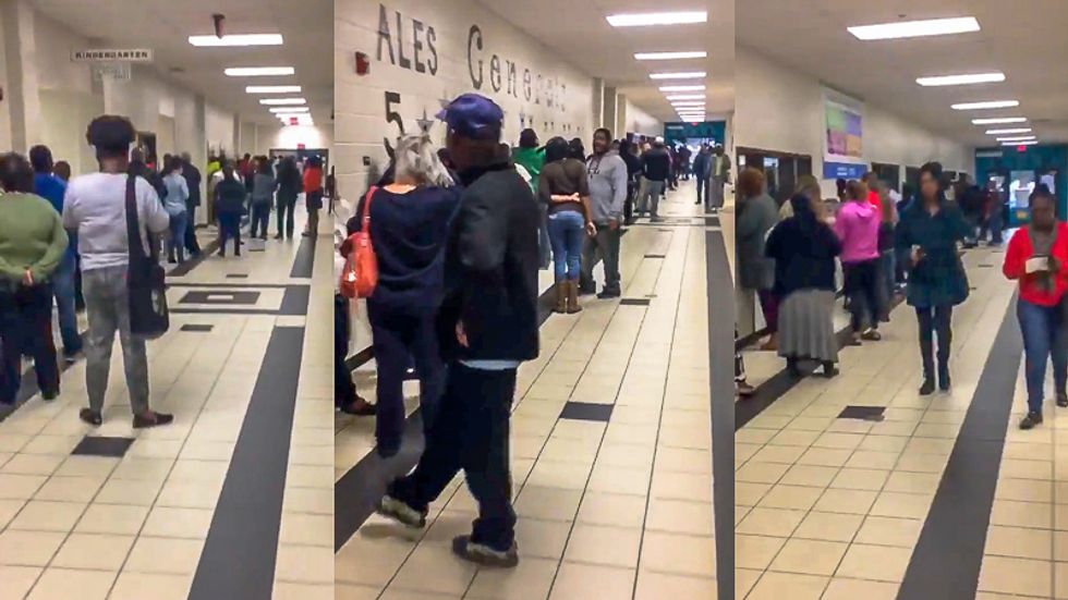 'This is suppression': Voting machines with missing power cords force hundreds of black Georgia voters to wait