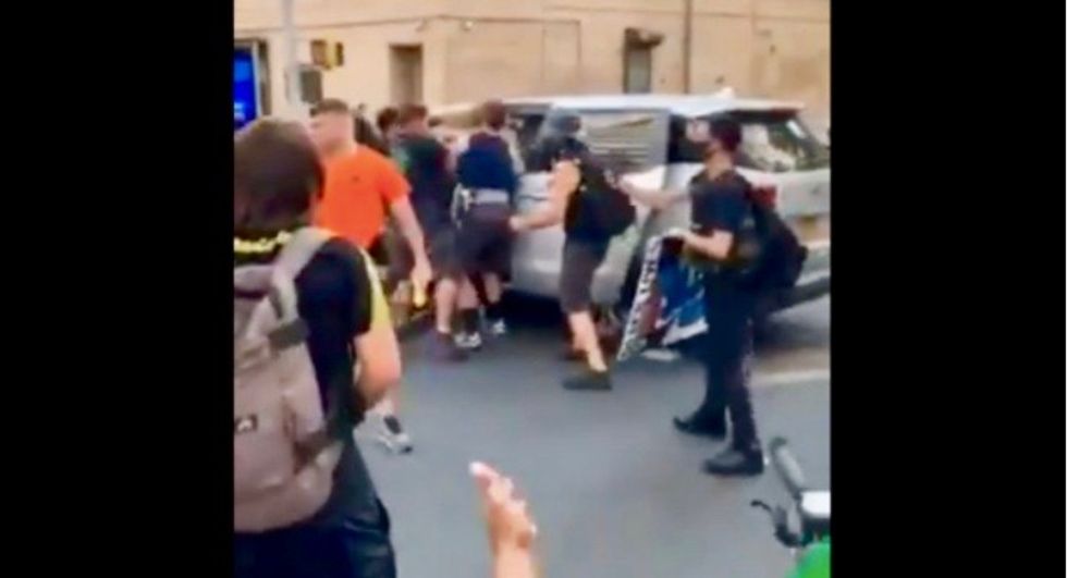 'This is kidnapping': Video shows plainclothes NYPD officers throwing protester into unmarked van