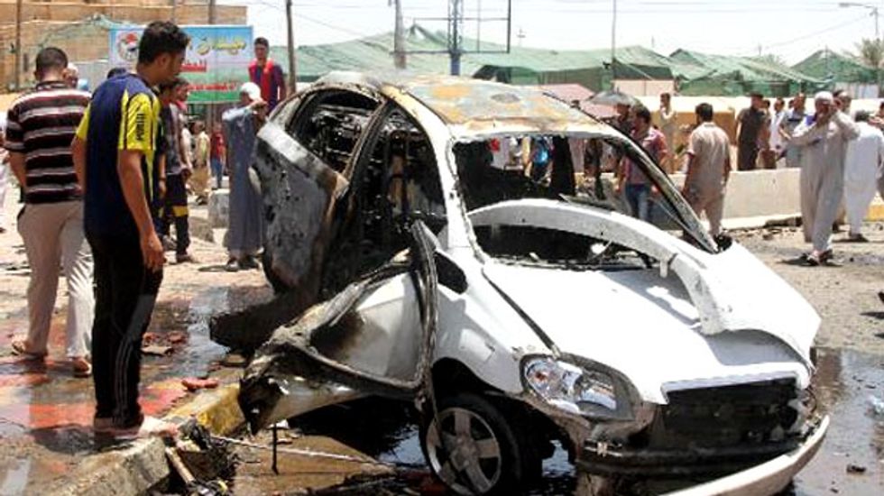Militants take hostages after seizing Iraq city council HQ