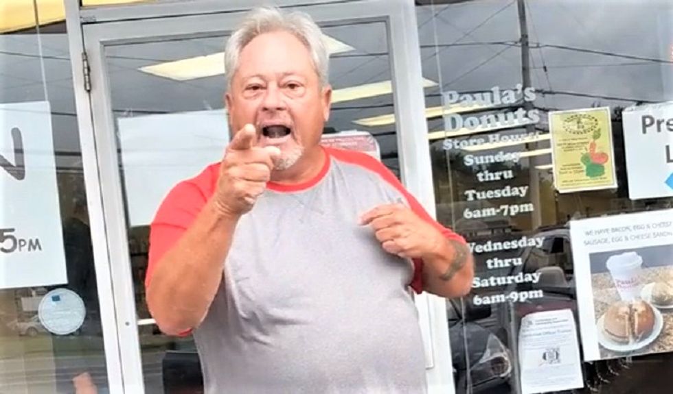 Maskless man has public meltdown over Black Lives Matter mask: 'You're a racist -- I suppose you kneel for the flag!'