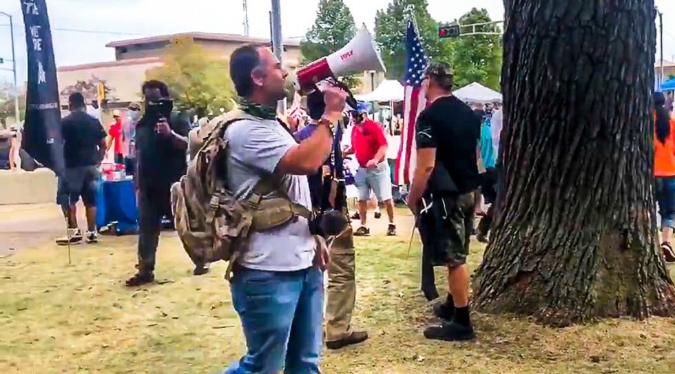 WATCH: Man with megaphone at Kenosha pro-Trump rally demands 'justice' for 'American hero' Kyle Rittenhouse
