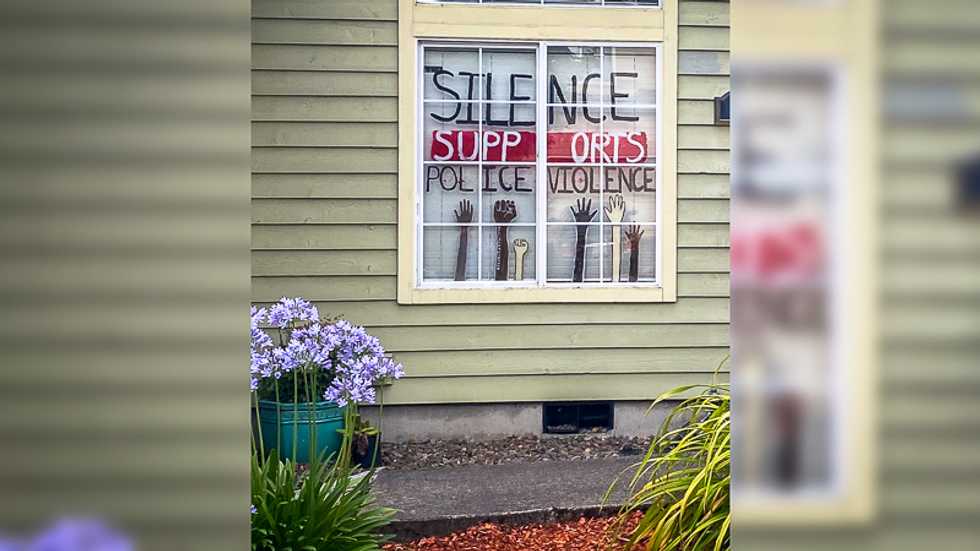 Neighbors accuse Black woman of 'driving down' property values with Black Lives Matter sign