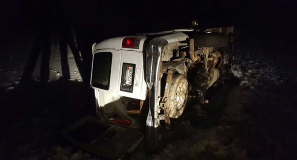 Oregon militant skids off a road, flips his van -- then gets cited for driving without a license