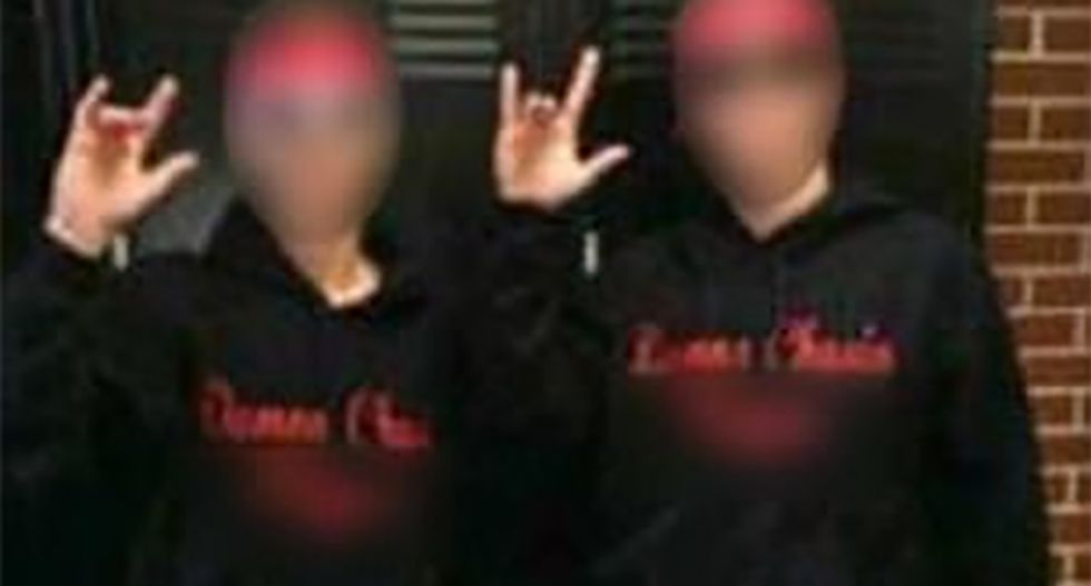 Louisiana high schoolers punished for wearing racist 'Demon chasing N***ers' shirt