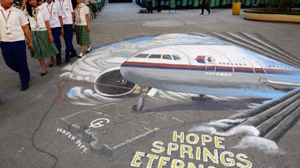Flight MH370 came down in Indian Ocean, Malaysian prime minister says