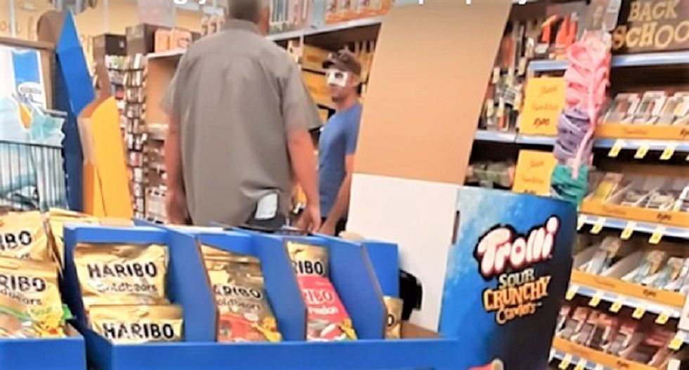 'Trumpster' berated by store workers for wearing mask over his eyes -- he responds by calling them 'sheep'