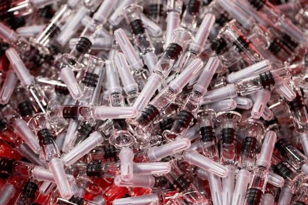 Amid COVID-19 crisis, flu shot makers see record US production